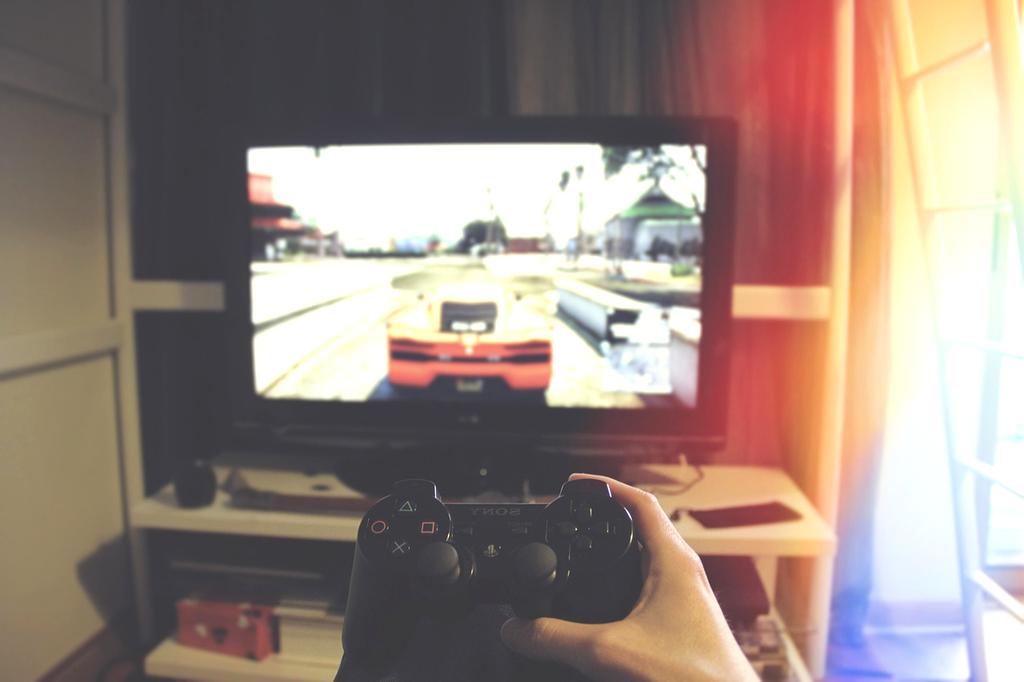 Person watching a smart TV with a streaming interface